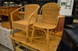Two wicker chairs.