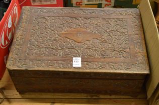 An Indian carved wood box.