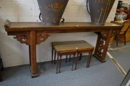 A good Chinese softwood altar table with carved and pierced supports.