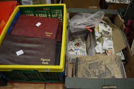A large quantity of cigarette and other collectors cards, several in albums.