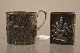 An Indian white metal mug and similar vesta box.