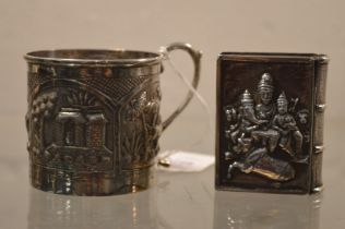 An Indian white metal mug and similar vesta box.