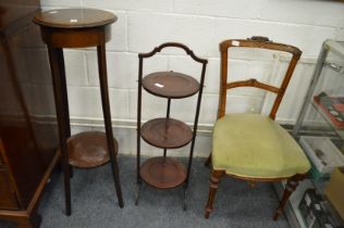 A jardiniere stand, folding cake stand and a Victorian dining chair.