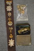 A good collection of military badges and buckles etc.