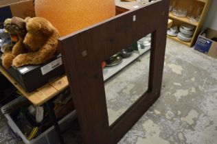 A large modern wall mirror.