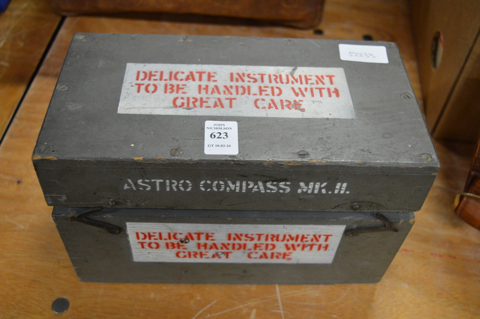 A boxed Astro compass MKII.