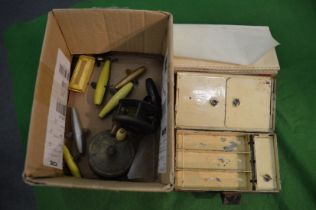Old fishing reels, a fly tin etc.