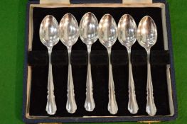 A cased set of six silver coffee spoons.