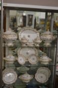 A good Victorian floral decorated and gilded part dinner service with various large tureens, sauce