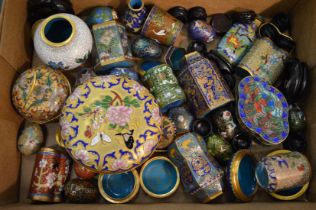 A good collection of Chinese and Japanese cloisonne miniature jars and covers, boxes, bottles etc.
