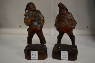 A pair of amusing carved wood Continental figures.