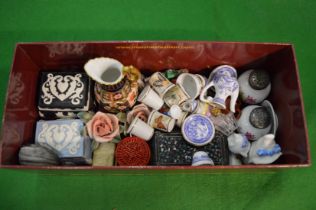 A collection of miniature porcelain and collectable to include a Crown Derby jug, thimbles etc.