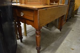 Pine drop-leaf table.