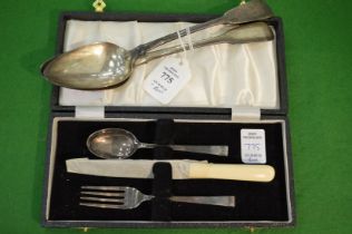 Two Georgian silver serving spoons and a cased silver Christening set.