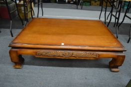 A large Chinese low coffee table.