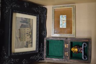 Decoratively framed print, Indian miniature and a carved wood box containing a Buddha.