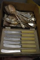 Plated flatware to include a cased set of six butter knives.