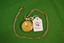 A 15 carat gold watch chain with decorative gilt metal fob watch.
