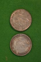 A George V crown 1935, stamped to the edge DECUS ET TUTAMEN ANNO REGNI XXV together with a George VI