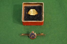 A gold signet ring and a 9 carat gold and enamel Royal Engineers bar brooch.