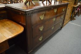 A large 19th century Continental mahogany three drawer chest.