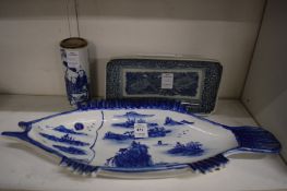 A Japanese blue pottery fish shaped dish and two other items.