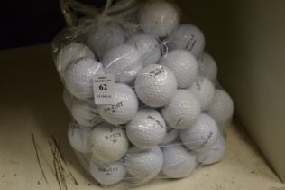 A bag of fifty Top-Flite golf balls.