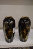 A pair of Japanese Komai style vases.