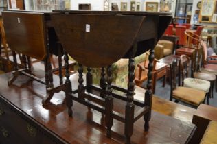 A small oak drop-leaf gateleg table.