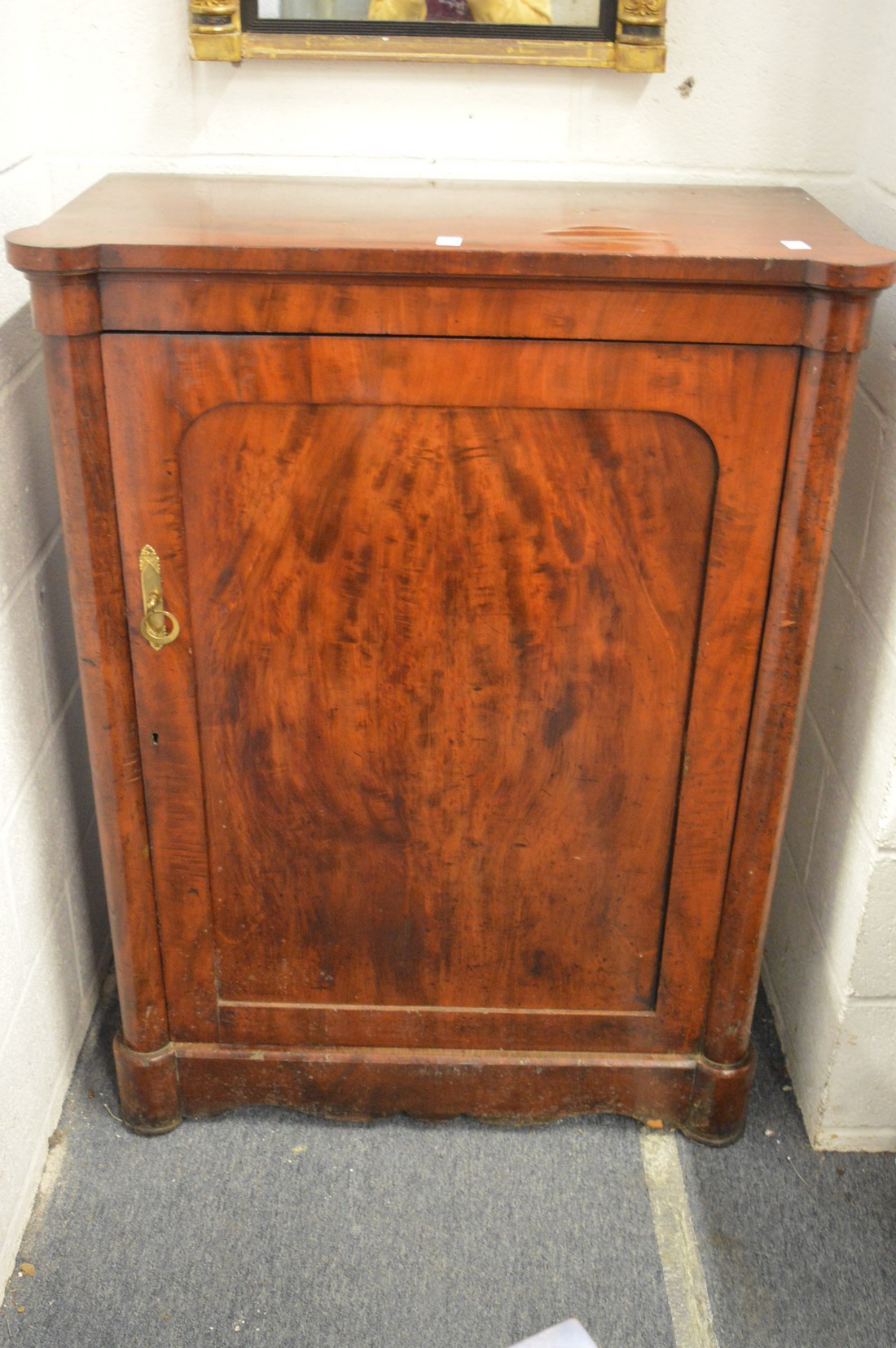 A Victorian mahogany pedestal cupboard.