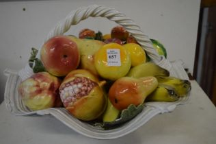 A Capodimonte porcelain basket of fruit.