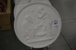 A set of four Copenhagen circular white biscuit porcelain plaques.