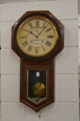 A drop dial wall clock, the dial signed R Salisbury & Sons, Guildford.