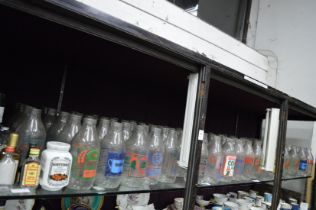 A large quantity of advertising milk bottles.