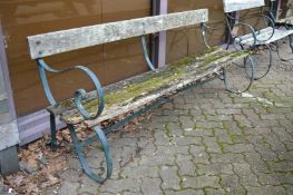 A metal and wooden slatted garden bench.