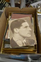 A signed black and white photograph of Ivor Novello together with numerous other photographs,