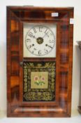 An American mahogany cased wall clock.