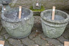 Two reconstituted stone planters.
