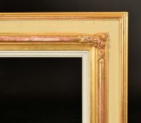 Early 20th Century a green painted and gilt composition frame, rebate size 30" x 22" (76 x 56cm),