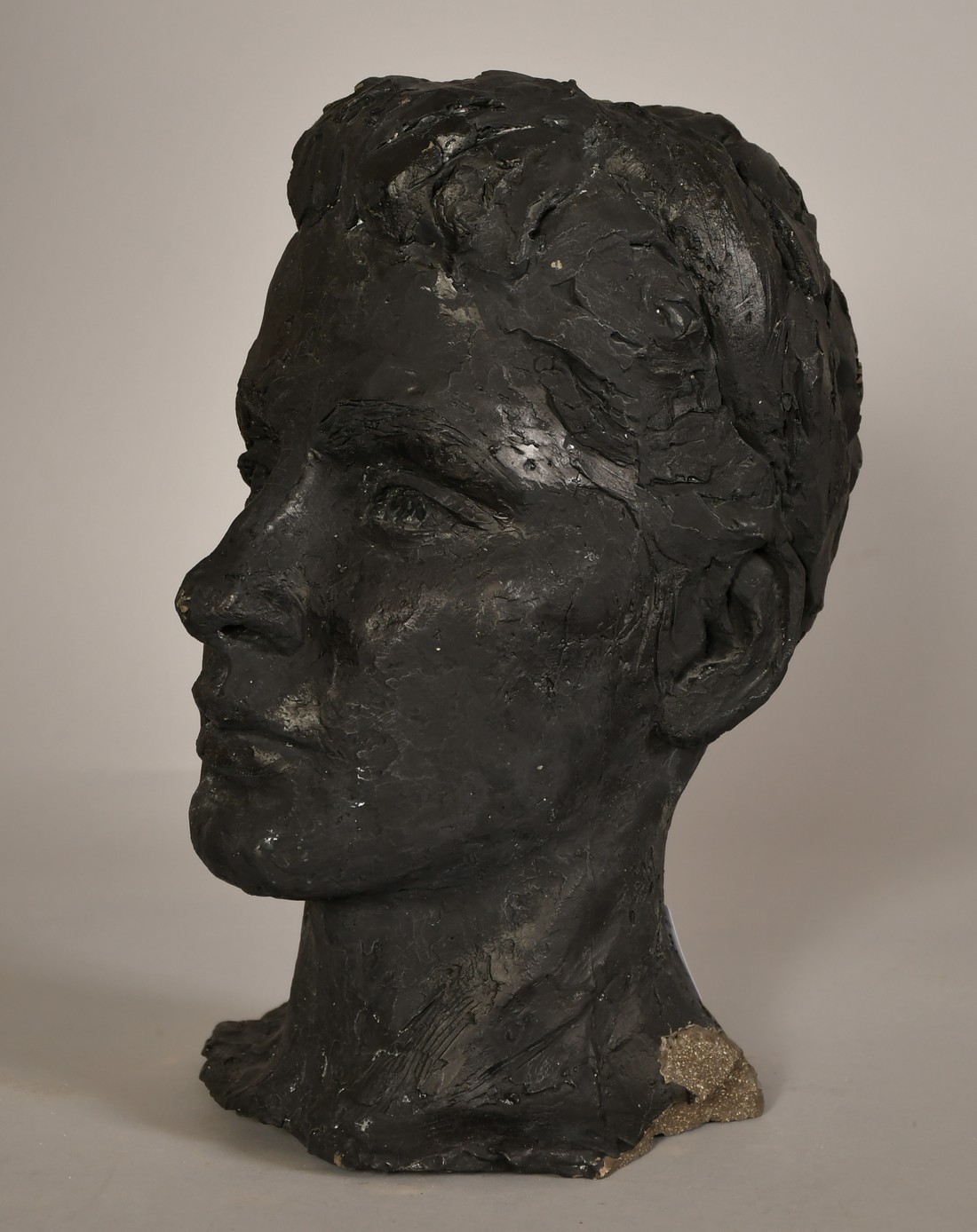 Sally Hersh (1936-2010), head study of a young woman with a bun, ciment fondu, 12" (30cm) high - Image 3 of 4