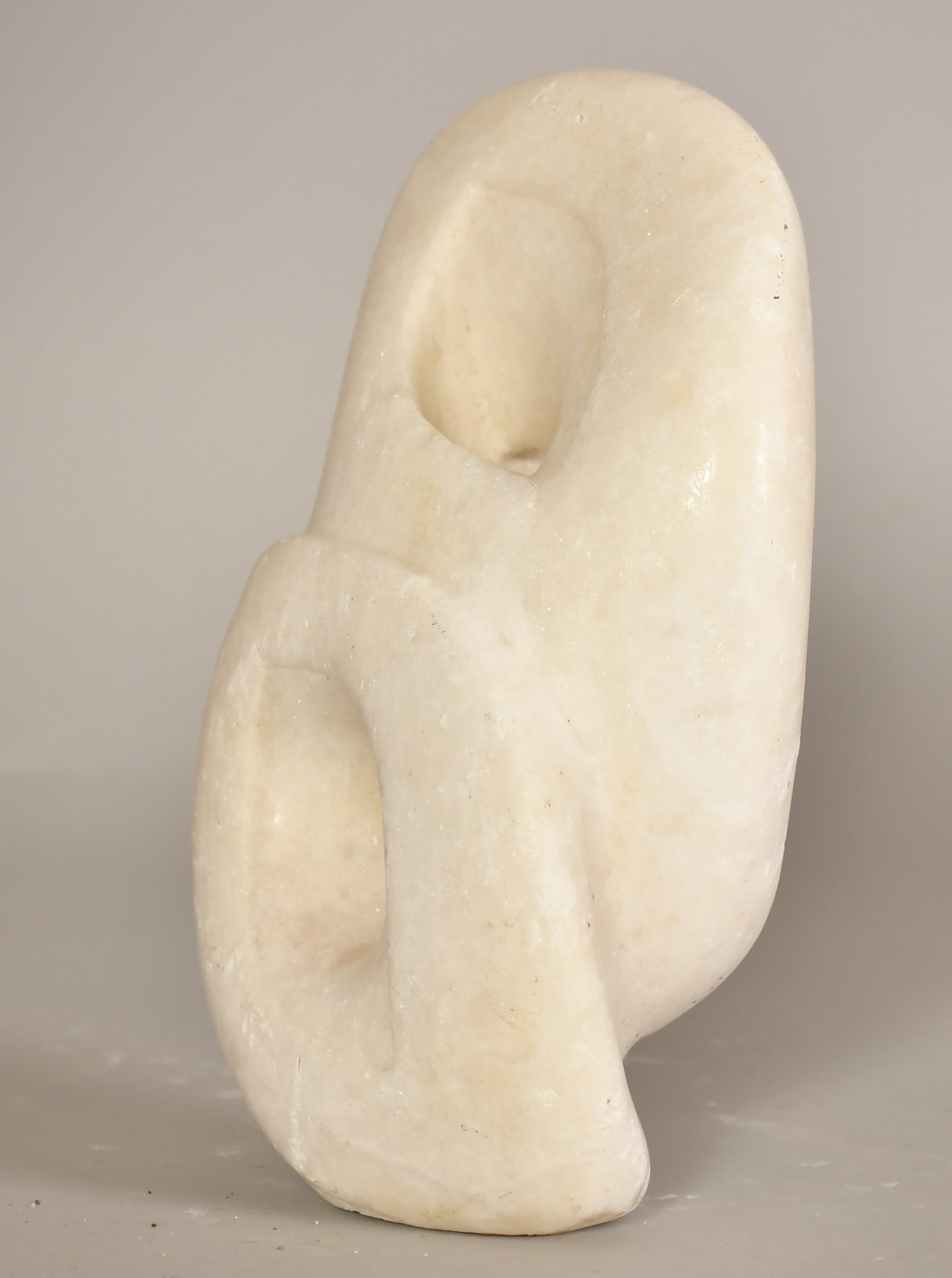 Sally Hersh (1936-2010), Hear no evil, alabaster, 9" (23cm) high overall. - Image 3 of 4