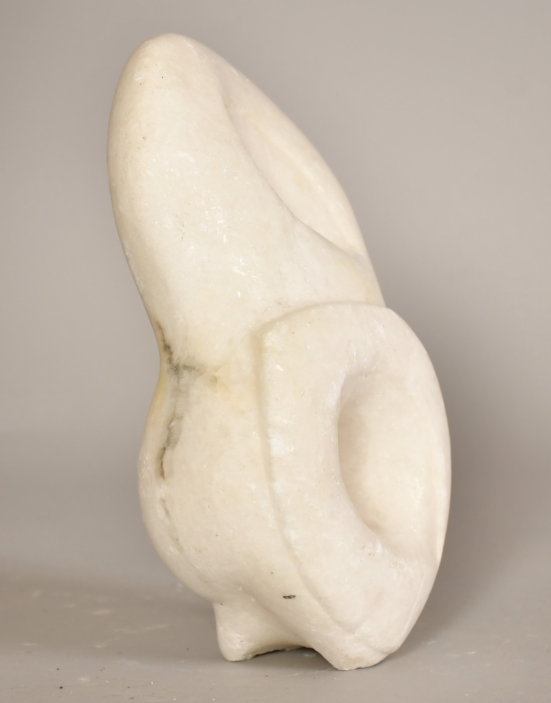 Sally Hersh (1936-2010), Hear no evil, alabaster, 9" (23cm) high overall. - Image 2 of 4