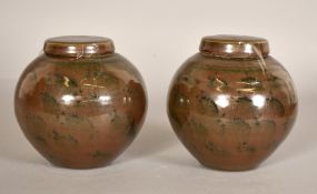 A pair of glazed studio pottery jars with covers, both around both around 5.5" (14cm) high, (2).