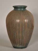 Roger Calero, Nicaragua, a green vase with incised textured decoration, signed, 13.5" (34cm) high.