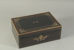A GOOD 19TH CENTURY FRENCH EBONY JEWELLERY BOX with ornate edges and inlaid with mother-of-pearl.