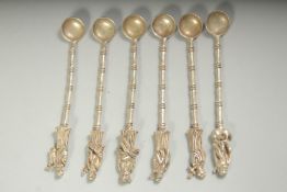 A SET OF SIX CHINESE WHITE METAL SPOONS.