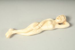 A DOCTOR'S CARVED BONE FIGURE. 5ins high.