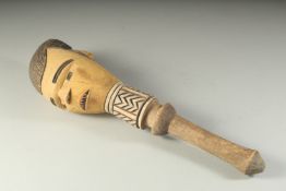 A PAINTED TRIBAL MACE. 17ins long.
