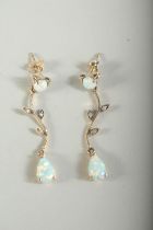 A GOOD PAIR OF 9CT GOLD, OPAL AND DIAMOND DROP EARRINGS, boxed.
