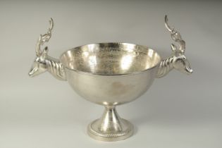 A LARGE CIRCULAR WINE COOLER with stag head handles. 14ins diameter.